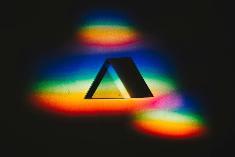 an image of a triangle in the dark