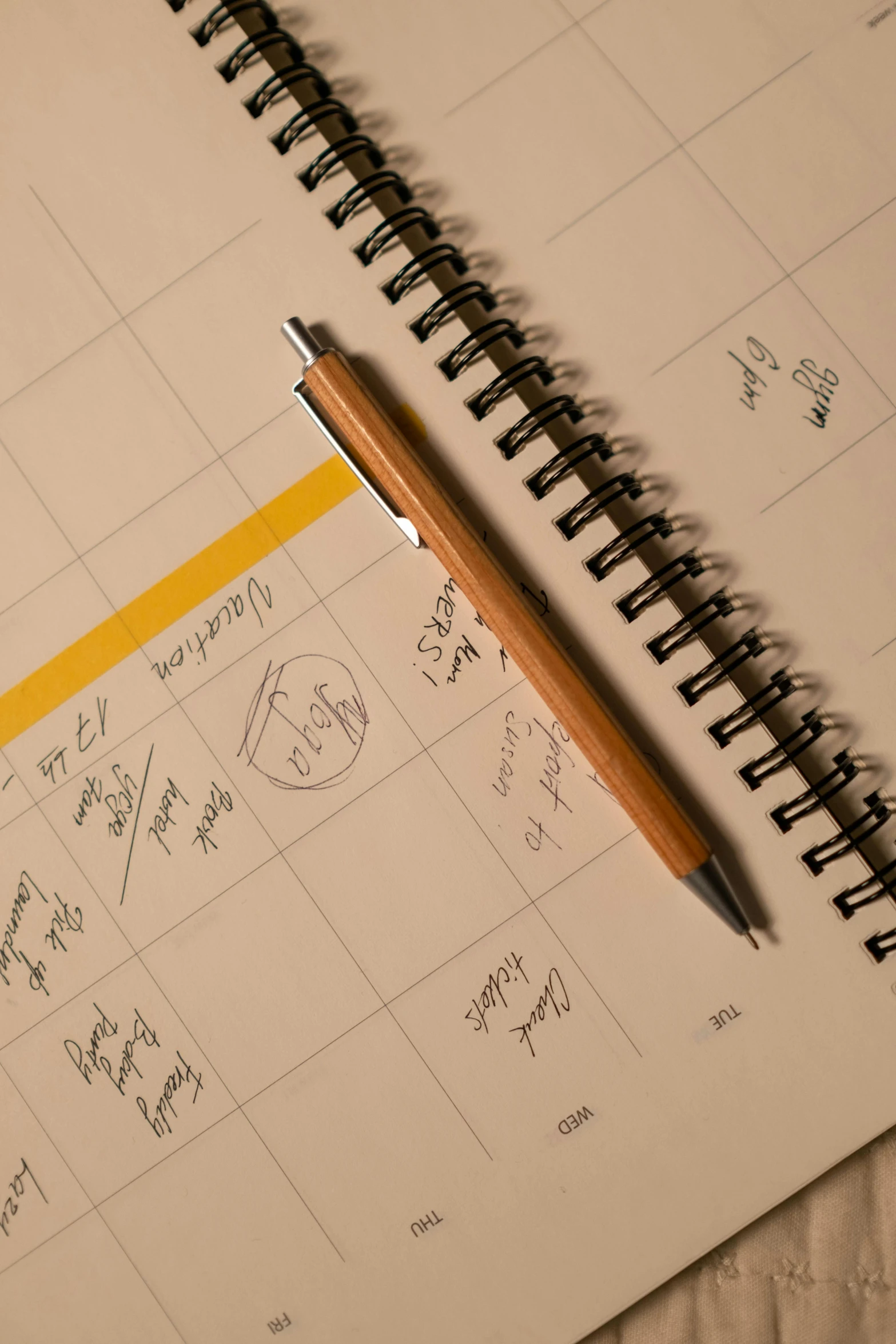 a pencil resting on the sheet of exercise manual