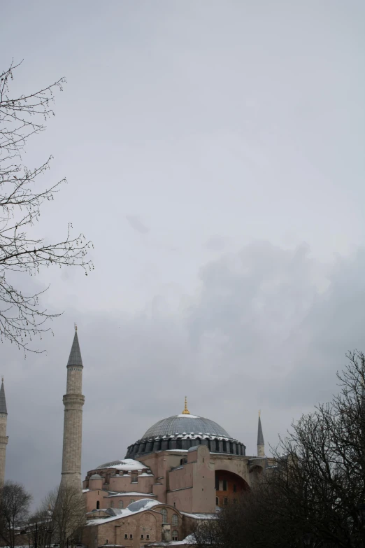 an old building with two towers and two spires