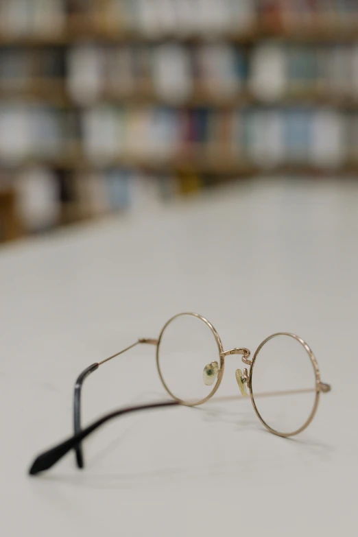 a pair of glasses lying on a table