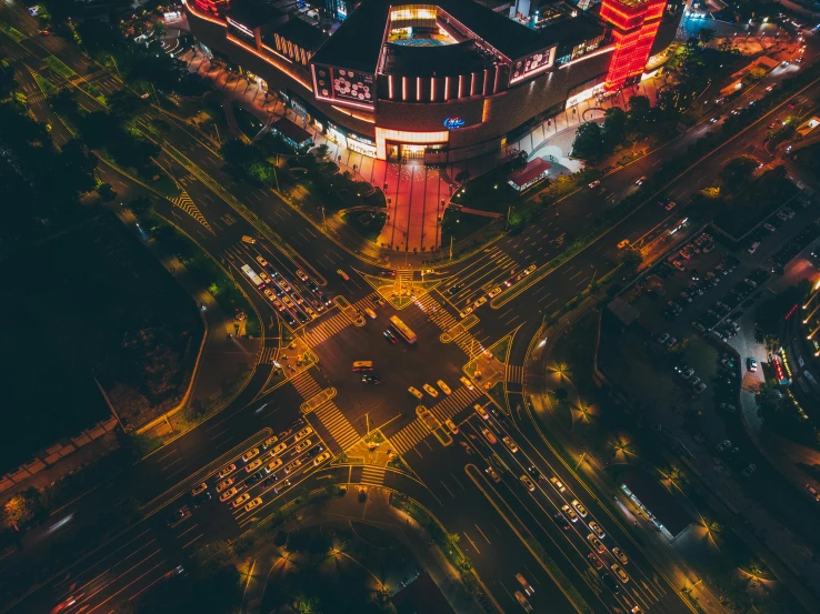 an aerial view of city streets at night