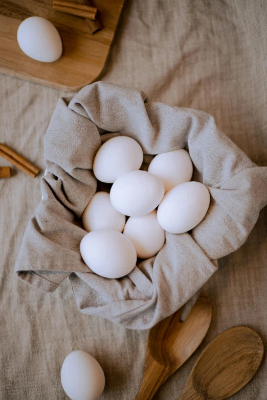 a cloth bag filled with white eggs