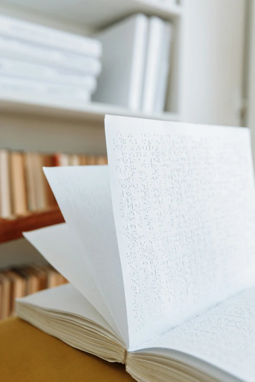 an open book laying open on a table