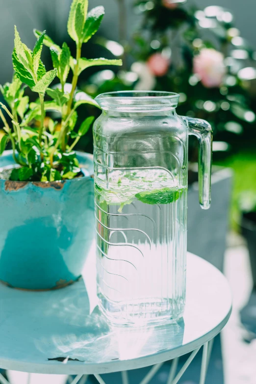 a glass jar that has water inside of it