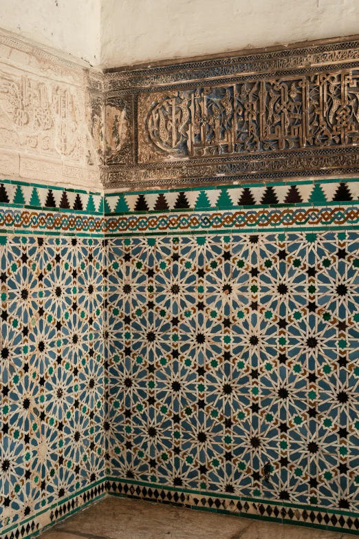 a corner wall made of tiles and ornaments