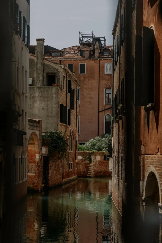 a canal running between two buildings on both sides of it