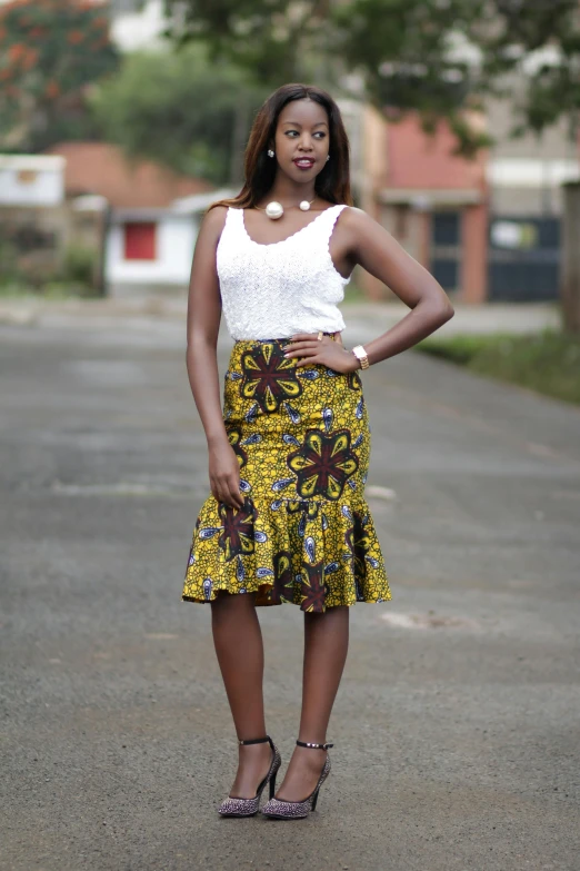 a young african woman posing for a po