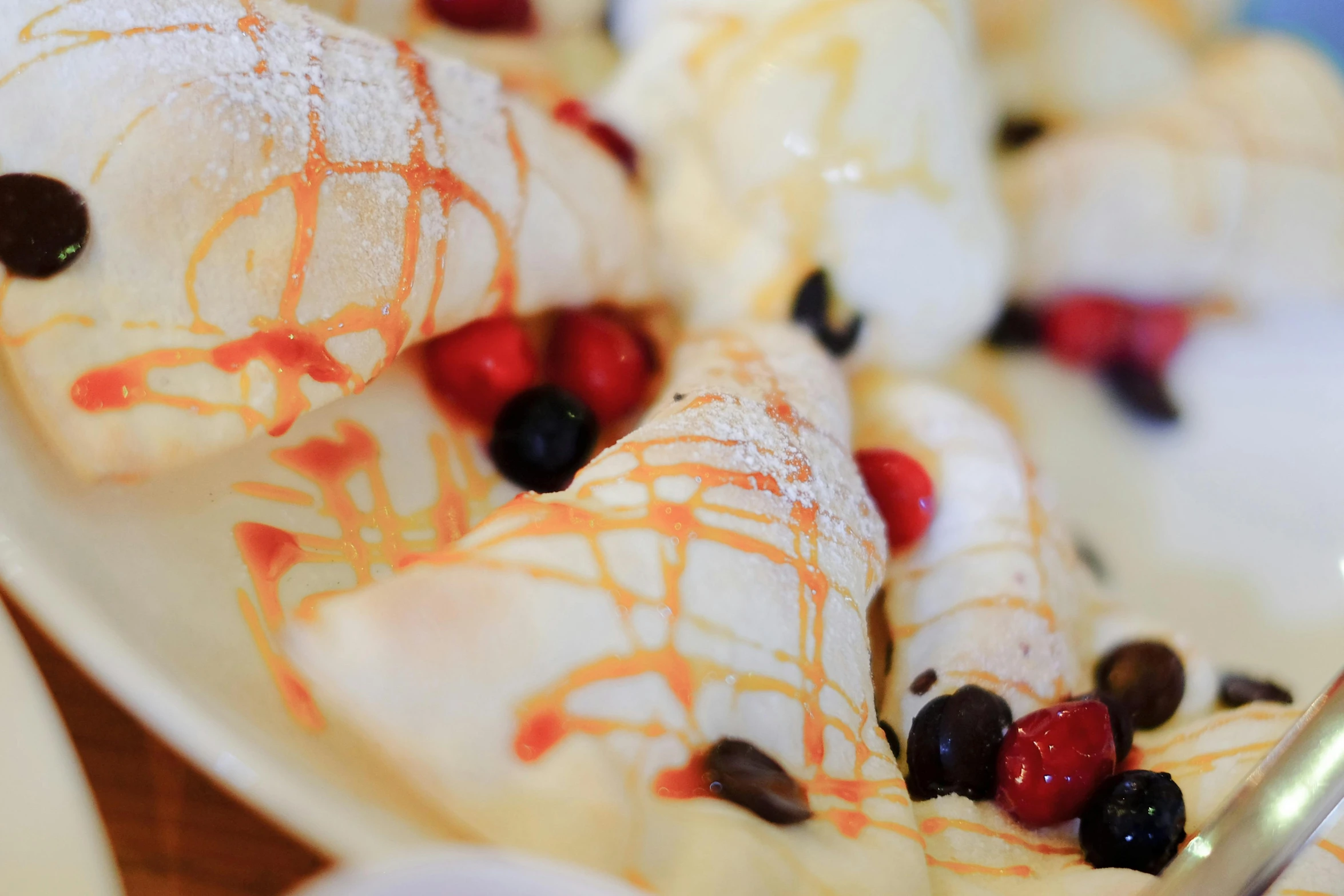 a close up view of pancakes on a white plate