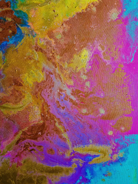 an orange and pink paint stroke with blue