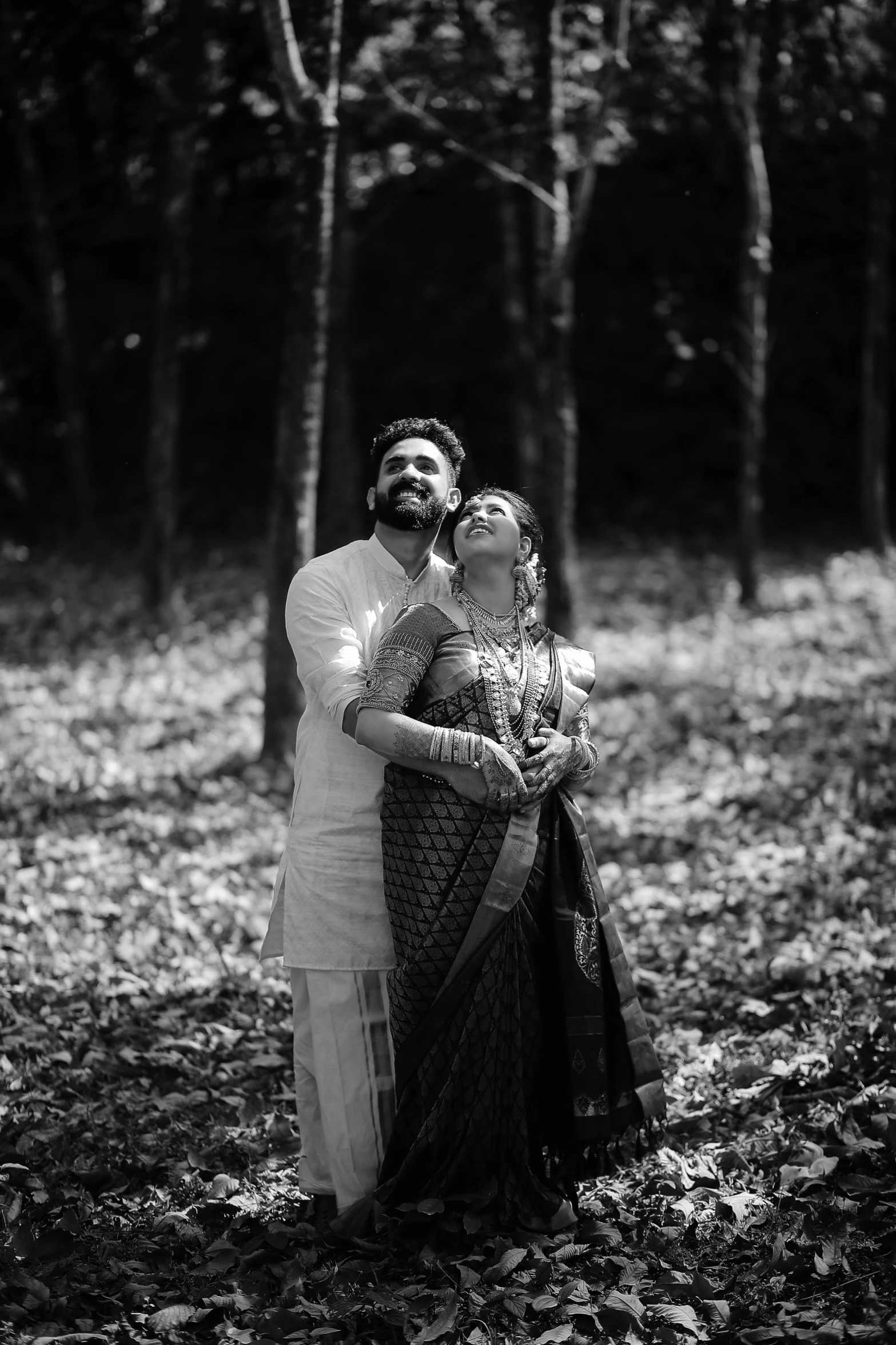 a man and woman pose for the camera