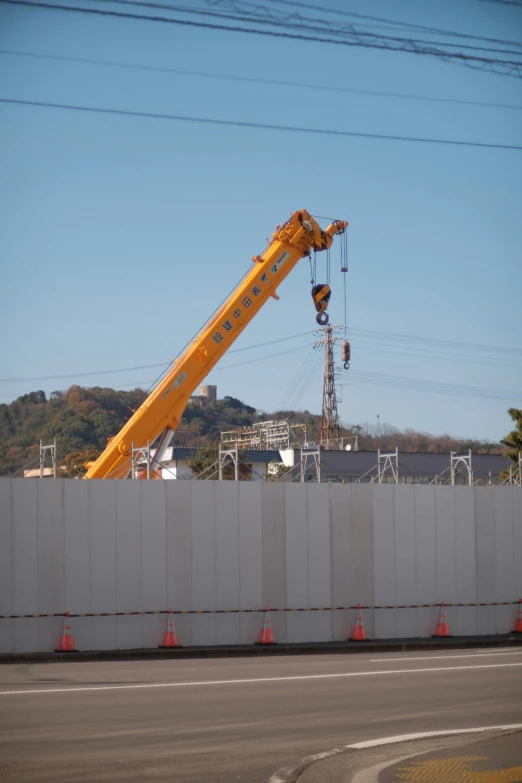 a construction crane on a building under construction