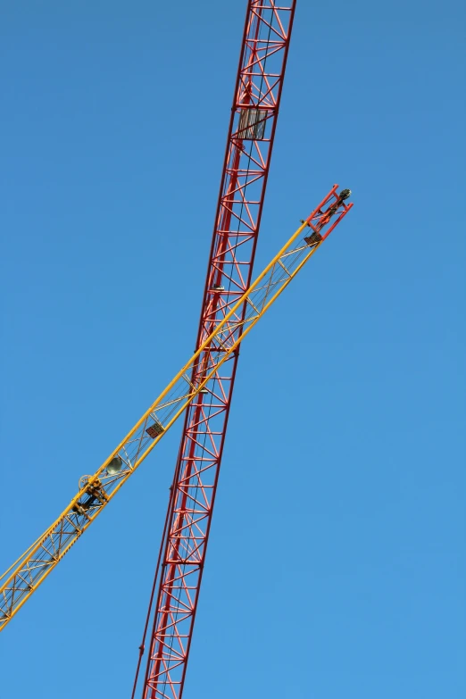 a large crane is up in the air