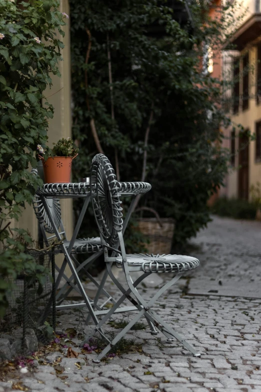 chairs that are sitting next to a bench