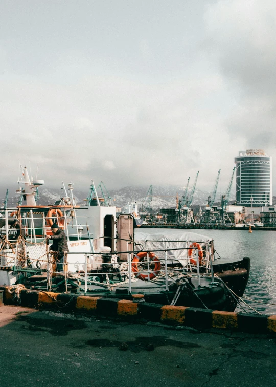 a large ship is docked in the harbor