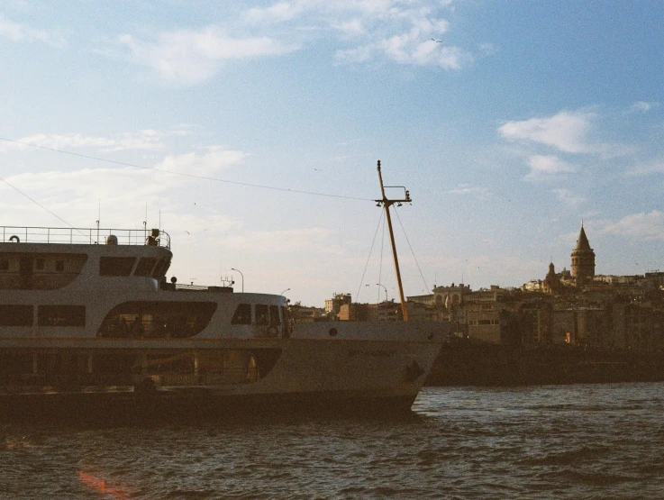 a boat is floating in the water near another boat