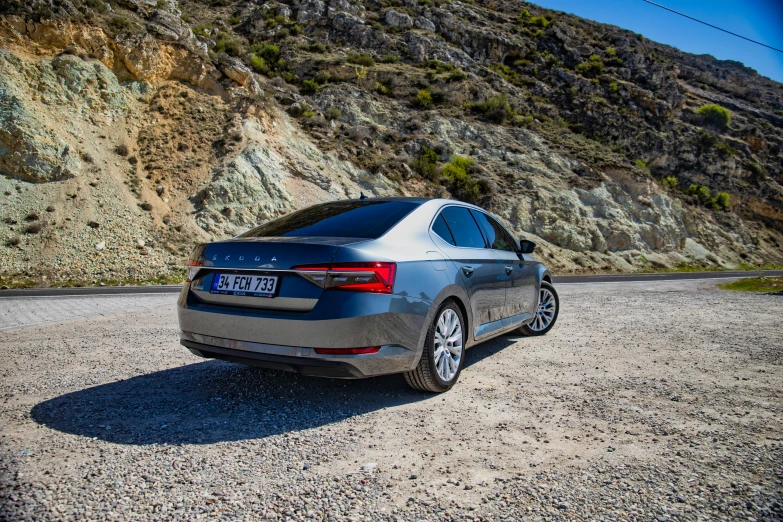 an audi sits on the side of a road