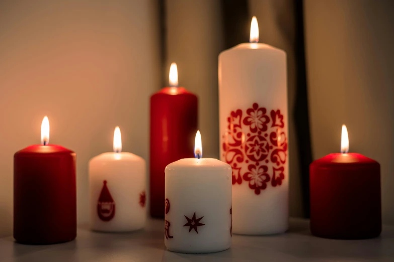 the candles are white with red decorations