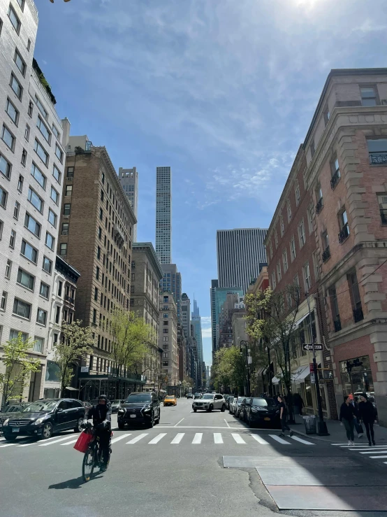 a street scene with focus on the building at the far end