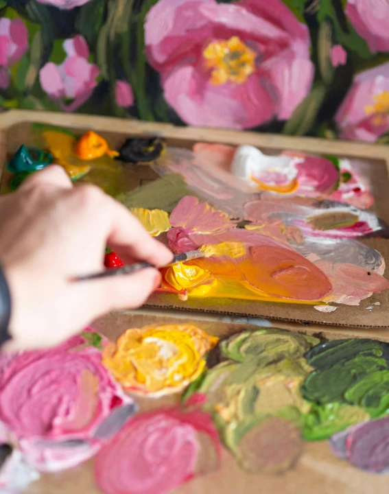 painting with floral designs on a sheet of paper