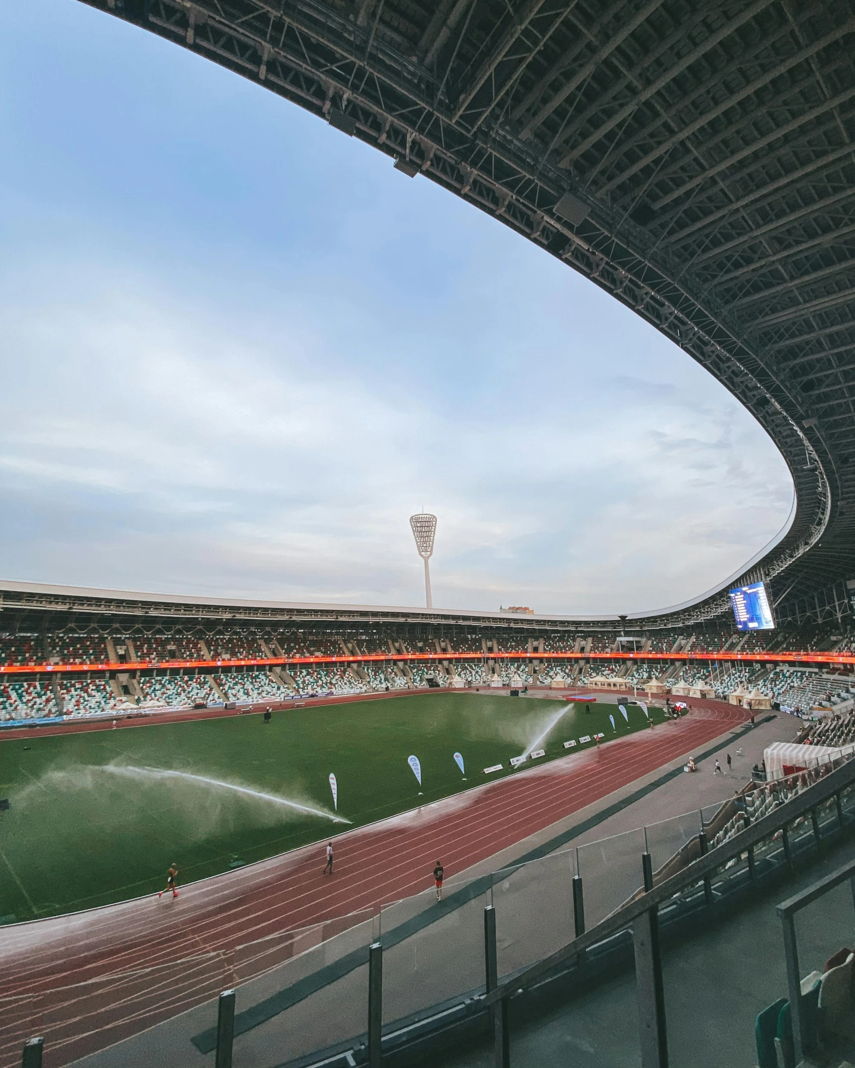 the inside of an indoor stadium is empty