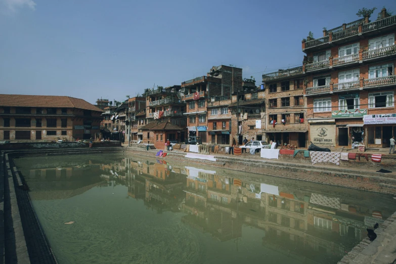 an old town with several buildings on the sides