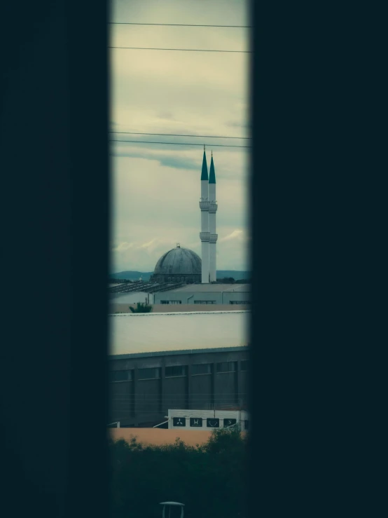 a view of a mosque from behind a window