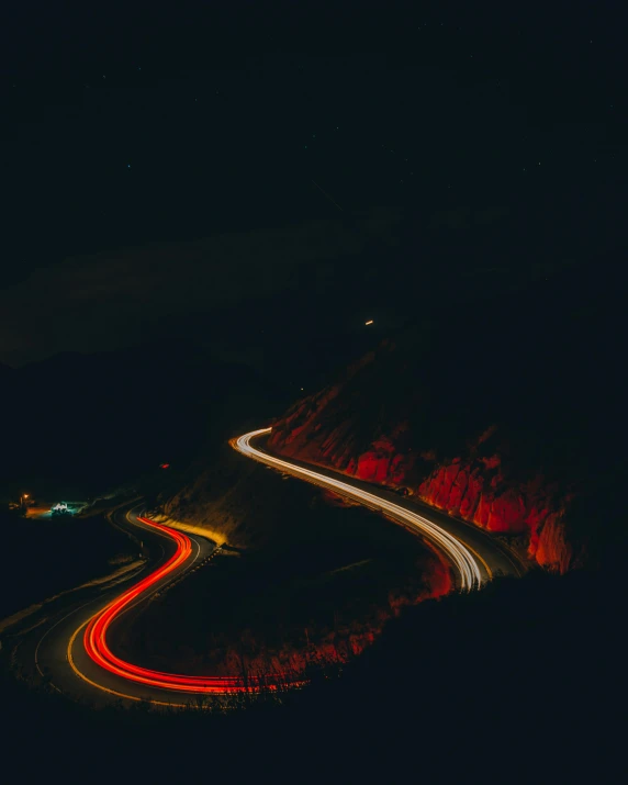 a night time po of a road that has been light colored