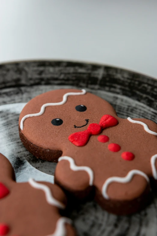 ginger shaped cookies on top of a plate