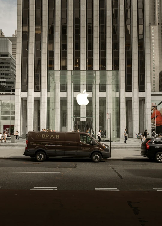 a van is parked outside of the building