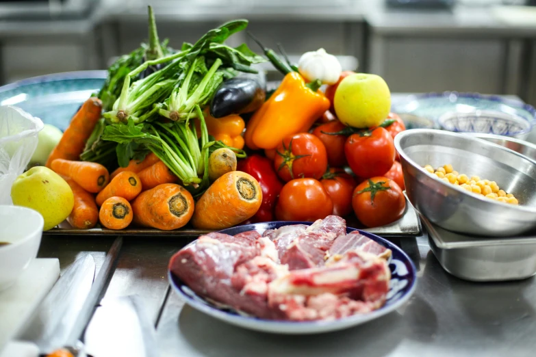 some food sitting on a table and on a plate