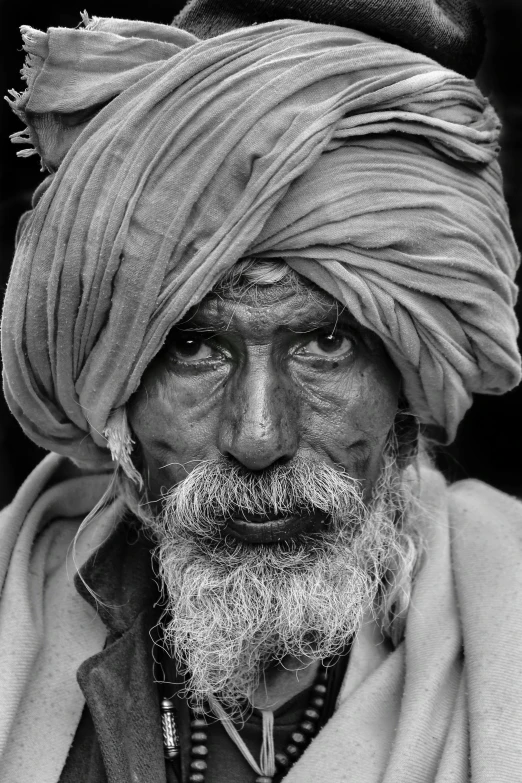 black and white po of an indian man