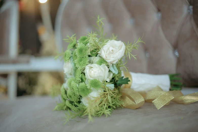 a bouquet of flowers sit on the ground