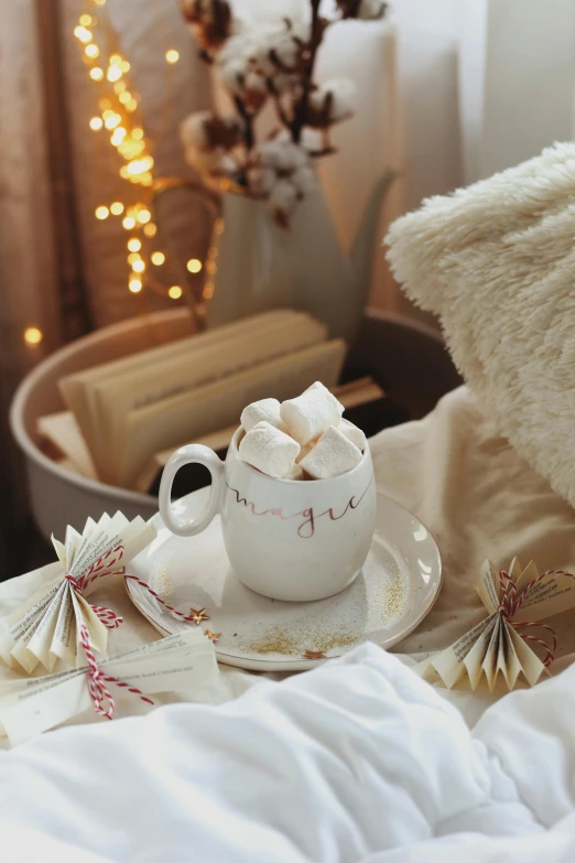 cup of  chocolate with white candy on it