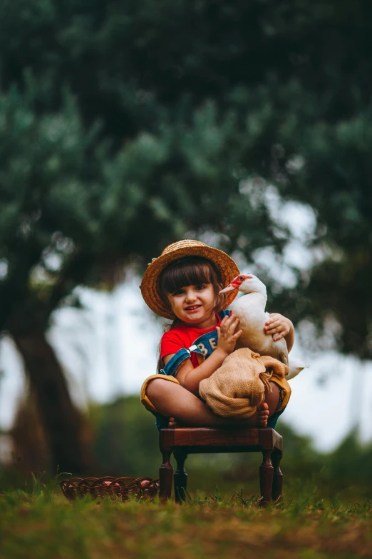 a small child is sitting in a chair