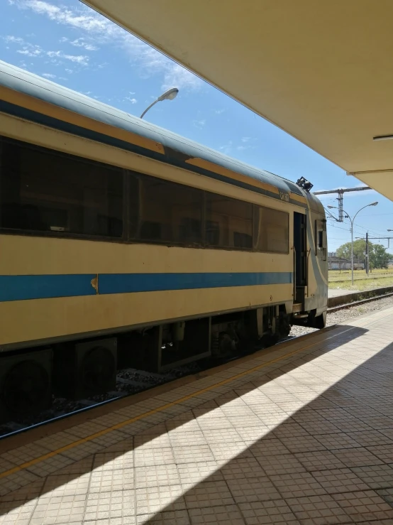 this train is pulling into the station for passengers