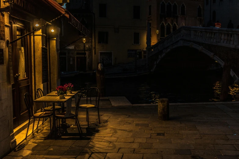 table set up at night outside an alley