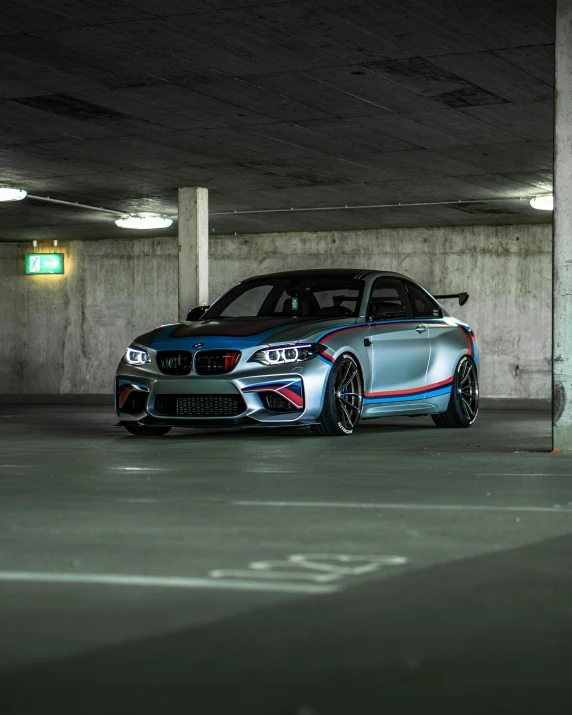 a bmw car is parked in the parking garage