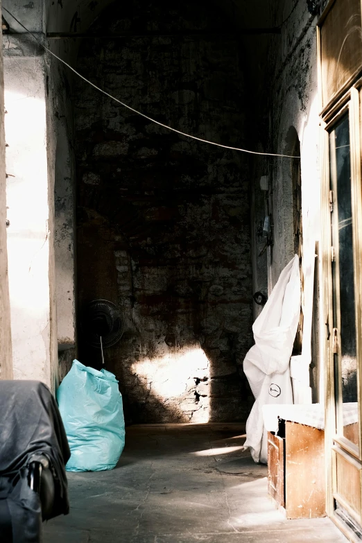 a view inside an abandoned building looking outside