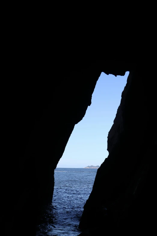 the view of an open ocean from a cliff