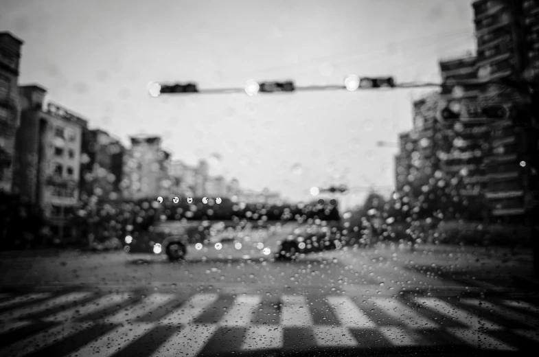 blurry picture of a city from behind on a rainy day