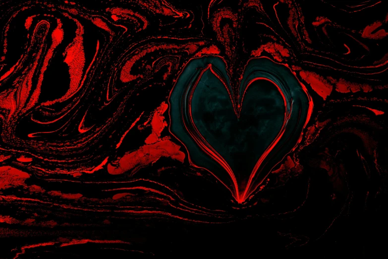 a red heart on a black background