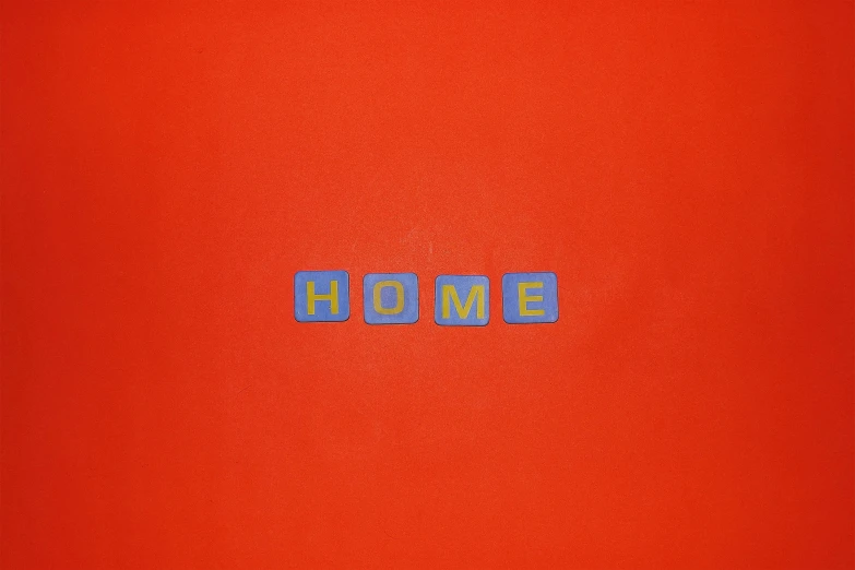 the word home is printed in blue and red