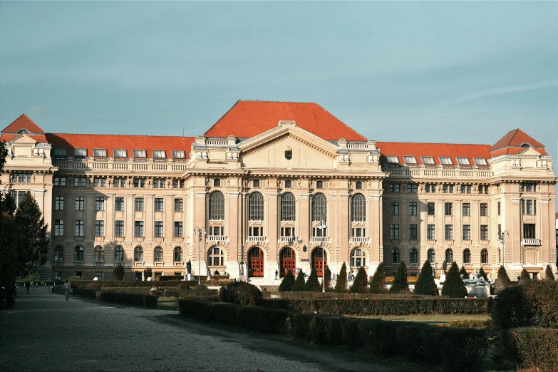 the large palace is very big and it is located in the middle of a park