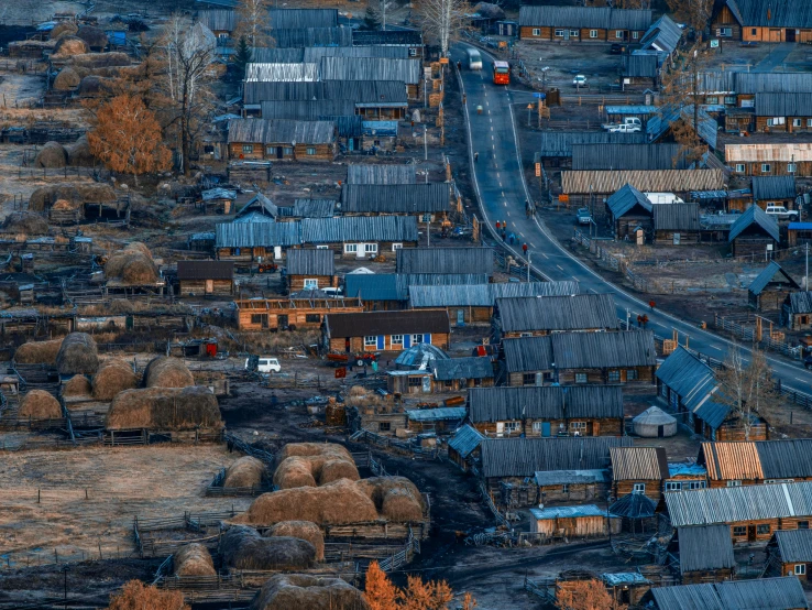 an aerial view of a group of houses and other buildings