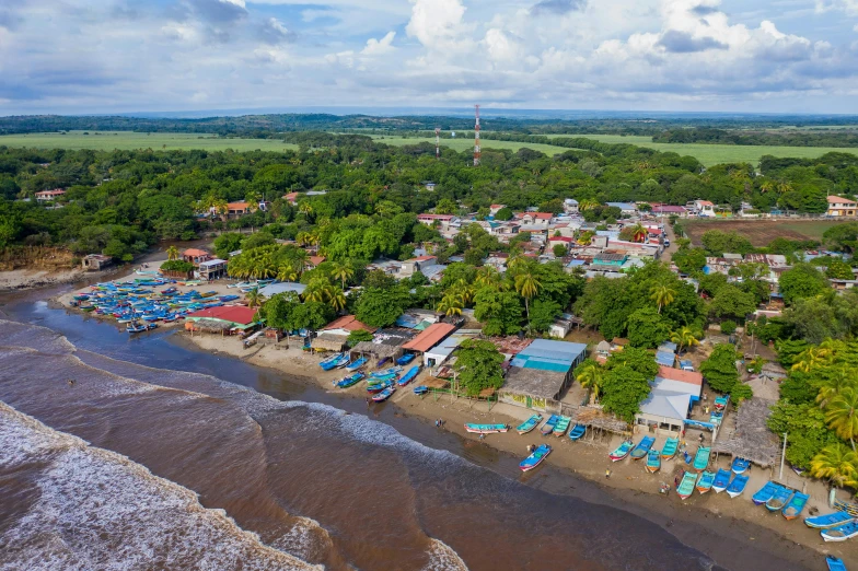 a small beach is next to the ocean