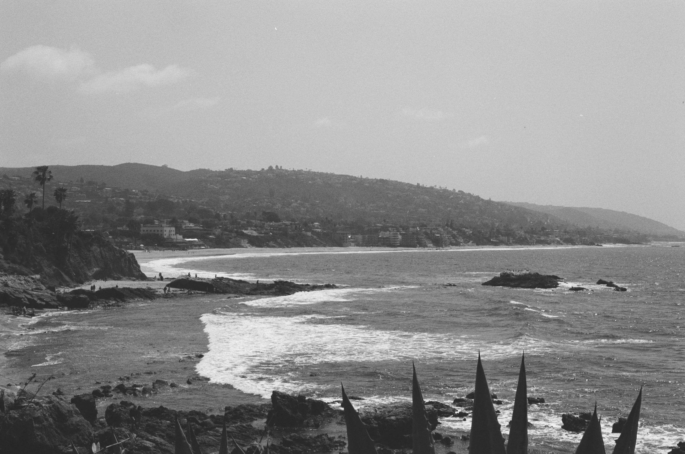 a view of a hill that is on the ocean