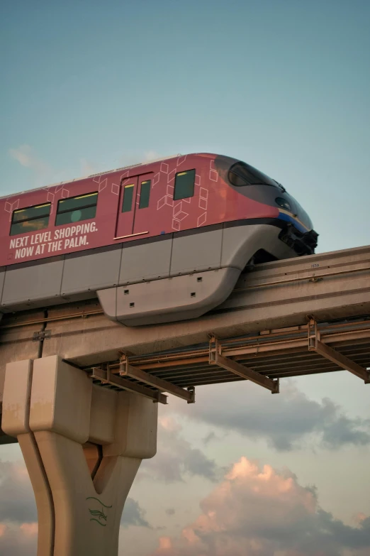 a train is riding across a steel bridge