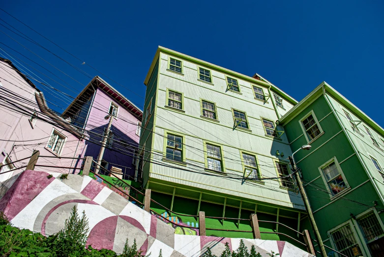 colorful buildings painted in different colors sit behind each other