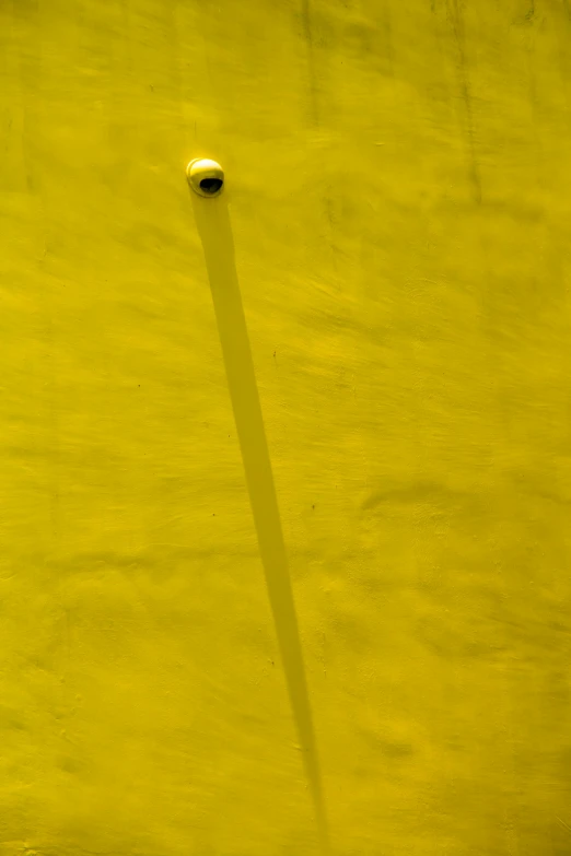a light shines on the top of a tennis court