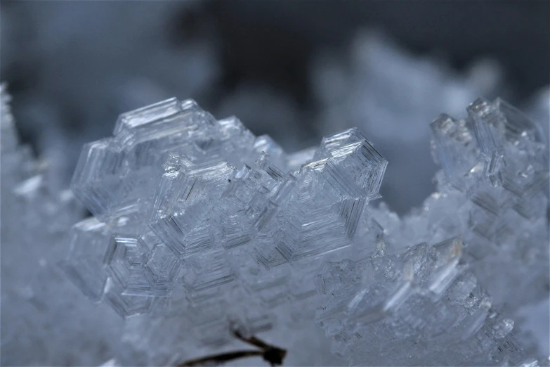 a close up of a crystal piece that looks like snowflakes
